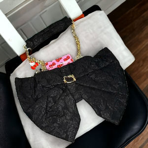 NWT Sanrio Hello Kitty Lace Bow Metal Logo And Charms Bag